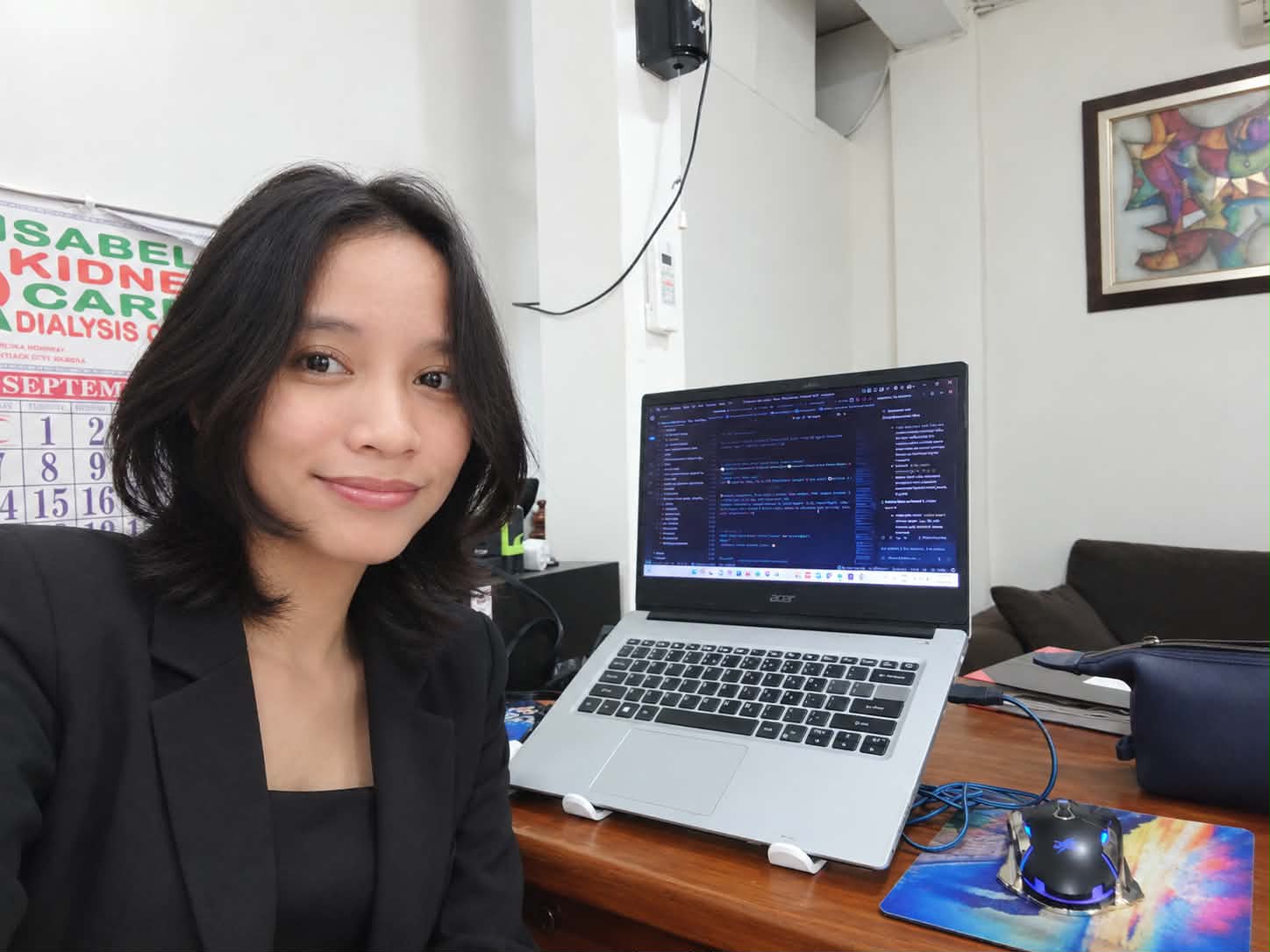 Joyce Yap - Systems Architect with Laptop